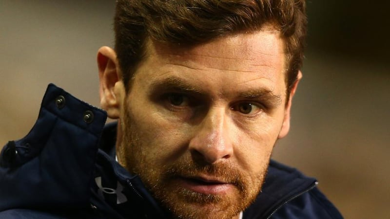 A dejected Andre Villas-Boas looks on as his Tottenham Hotspurs side are torn apart by Liverpool at White Hart Lane. Photograph: Paul Gilham/Getty Images