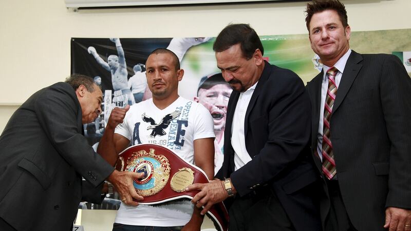 Sean Gibbons (right) with Francisco Varcarcel, Orlando Salido and Luis Perez at the presentation of Salido’s WBO featherweight belt in Mexico City in 2011. Photo: Manuel Velasquez/Jam Media/LatinContent/Getty Images