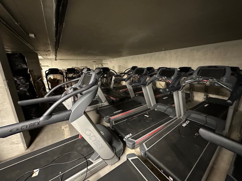 The warehouse itself is flooded with everything from treadmills and to squat racks to spring-loaded resistance machines