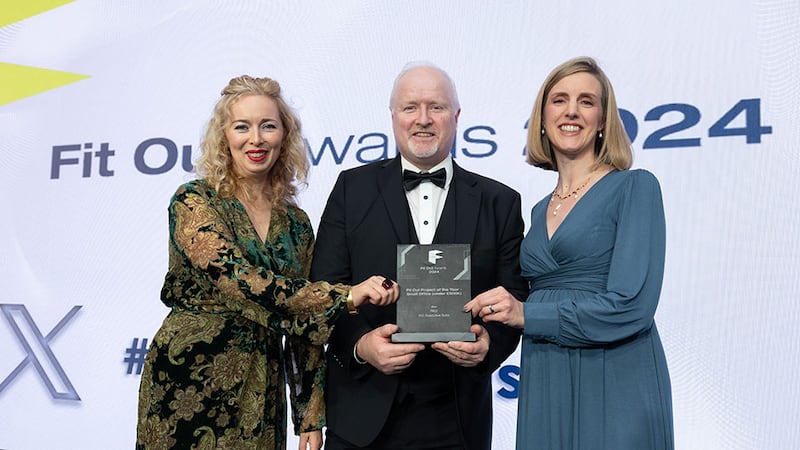 Columb Casey, director of MJF Interiors, presents the fit out project of the year - small office (under €500k) award to Candace White and Danielle Broe Fox, RKD