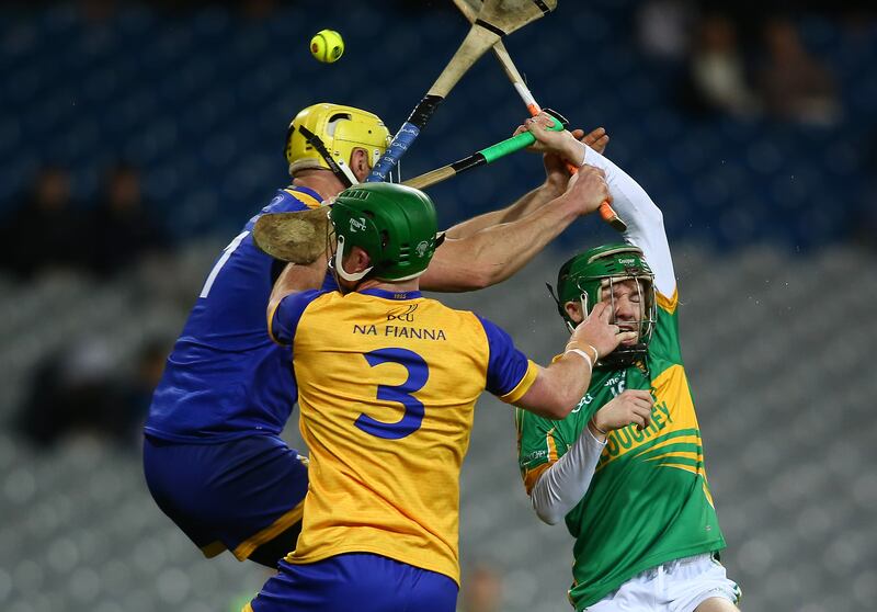 Kilcormac-Killoughey's Adam Screeney tries to flick past Na Fianna's Jonathan Tracey. Photograph: Ken Sutton/Inpho