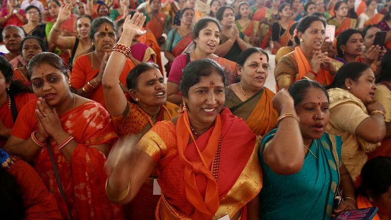 Hindu devotees in Bangalore watch live coverage of the inaugural ceremony of the new temple on the site of the old Babri mosque in Ayodhya on January 22nd. Photograph: Jagadeesh Nv/EPA-EFE