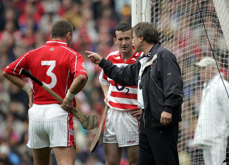 Cork manager Donal O'Grady with Diarmuid O'Sullivan and Donal Óg Cusack during the 2004 All-Ireland hurling final. Photograph: Patrick Bolger/Inpho