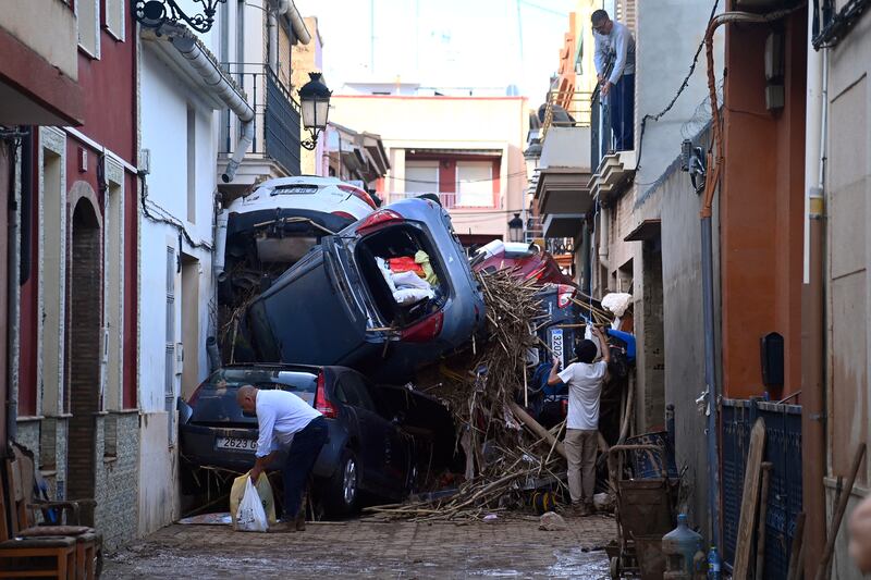 Debris blocks a street in the town of Paiporta, Valencia, on Friday. Photograph: Jose Jordan/AFP via Getty