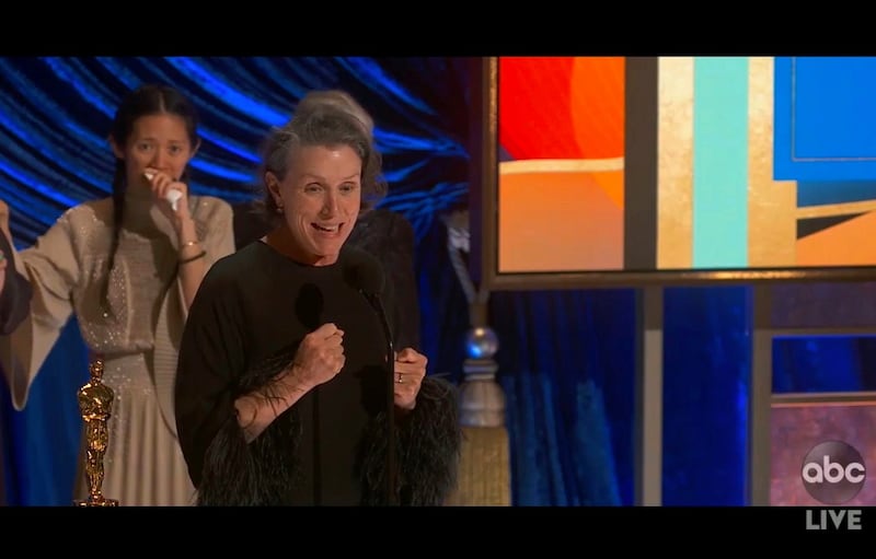 In this video image provided by ABC, Frances McDormand accepts the best picture award for "Nomadland" as director Chloe Zhao looks on at the Oscars on Sunday, April 25, 2021. (ABC via AP)