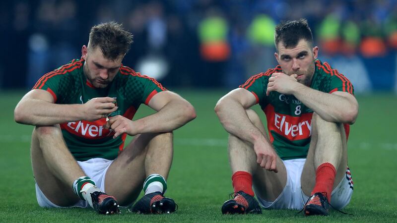 Mayo’s Aidan O’Shea and Séamus O’Shea sit on the Croke Park pitch after the All-Ireland final replay defeat to Dublin in 2016. Photograph: Donall Farmer/Inpho