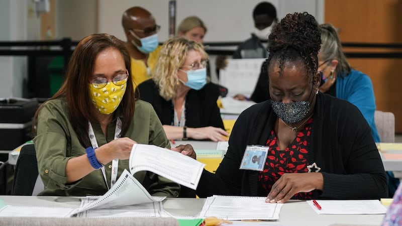 Workers recount election ballots by hand in Gwinnett County, Georgia,  on  November 13th. Photograph: Nicole Craine/New York Times