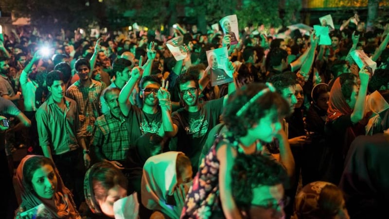 Rohani supporters  celebrate his victory in Iran’s presidential election on a street in Tehran. Photograph: Fars News/Sina Shiri/Reuters