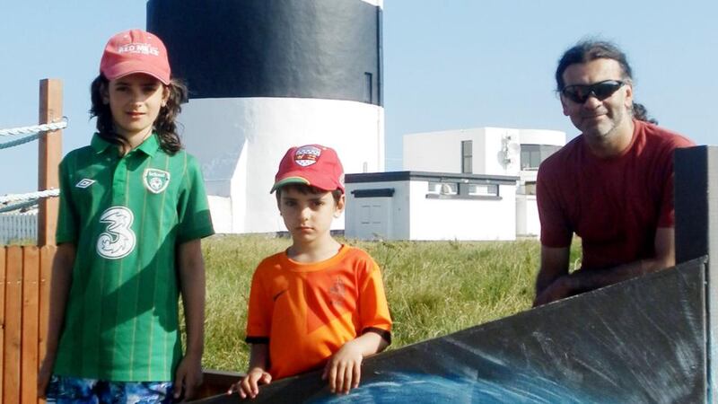 An undated family photo (issued by gardaí as part of a Child Rescue Ireland alert) shows Sanjeev Chada (43) with his sons Eoghan (10; left) and Ruairí (5). The bodies of the boys were found at the scene of a car crash in Co Mayo yesterday afternoon.