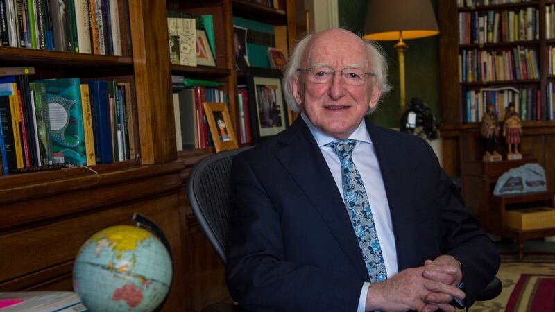 Arás an Uachtaráin: Michael D Higgins in his study at his official residence. Photograph: Brenda Fitzsimons