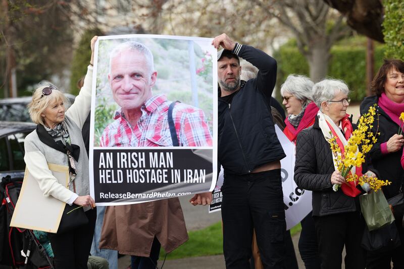 Supporters of Bernard Phelan and his family hold a vigil outside the Iranian Embassy in Blackrock, Dublin, renewing demands for his release. Photograph: Laura Hutton