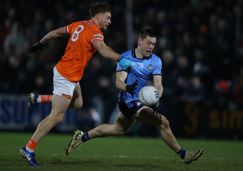 Armagh's Jason Duffy tackles Con O’Callaghan of Dublin. O’Callaghan has kicked three two-pointers across the last two games. Photograph: Leah Scholes/Inpho 