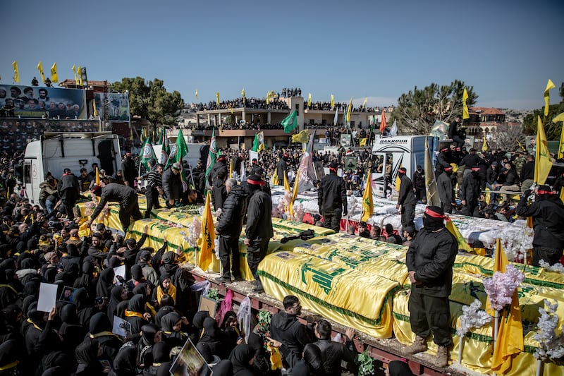 Coffins at a funeral for 95 people in Aitaroun, close to the Israeli border. Photograph: Sally Hayden