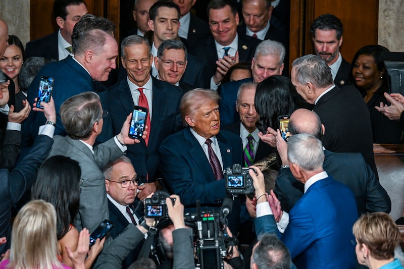 Donald Trump arrives to deliver his address to a joint session of Congress. Photograph: Kenny Holston/The New York Times