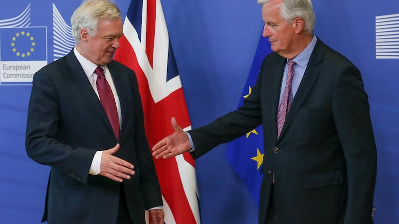 Negotiations begin: The UK’s David Davis  is welcomed by Michel Barnier, the EU’s  chief negotiator. Photograph: EPA/Stephanie Lecocq