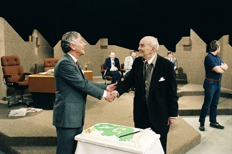 The Late Late Show: host Gay Byrne greets Seán MacBride on the set designed by Charles Self