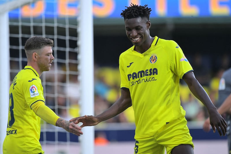 Villareal's Nicolas Jackson and Alberto Moreno during a Spanish league match against Cadiz. Photograph: Jose Jordan/AFP/Getty Images