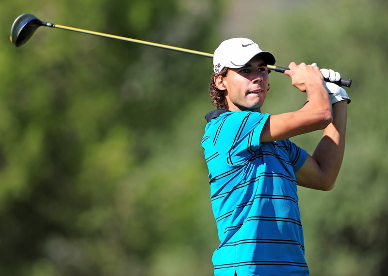 Spanish tennis player Rafael Nadal playing a tee shot during a Pro-Am  at the Club de Campo del Mediterraneo in Spain. Photograph: Stuart Franklin/Getty Images