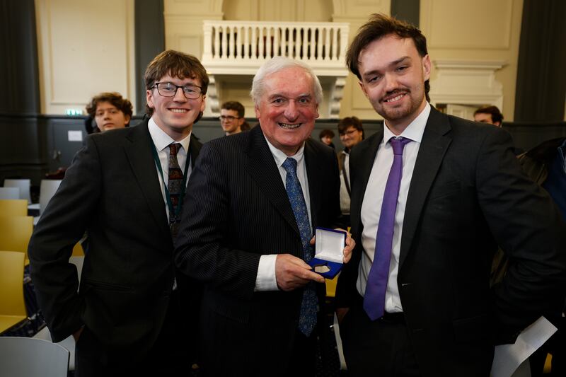 Bertie Ahern with Trinity College Dublin Law Society members James Ryan and Graham Doran. Photograph: Nick Bradshaw