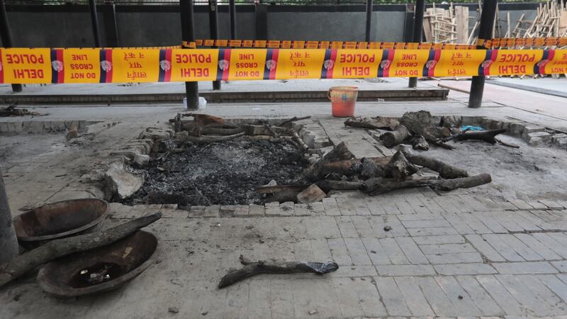 Police tape seals the crematorium where the nine-year-old girl was cremated. Photograph: Rajat Gupta/EPA