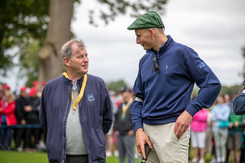 JP McManus with Limerick hurler Gearoid Hegarty. Photograph: Morgan Treacy/Inpho