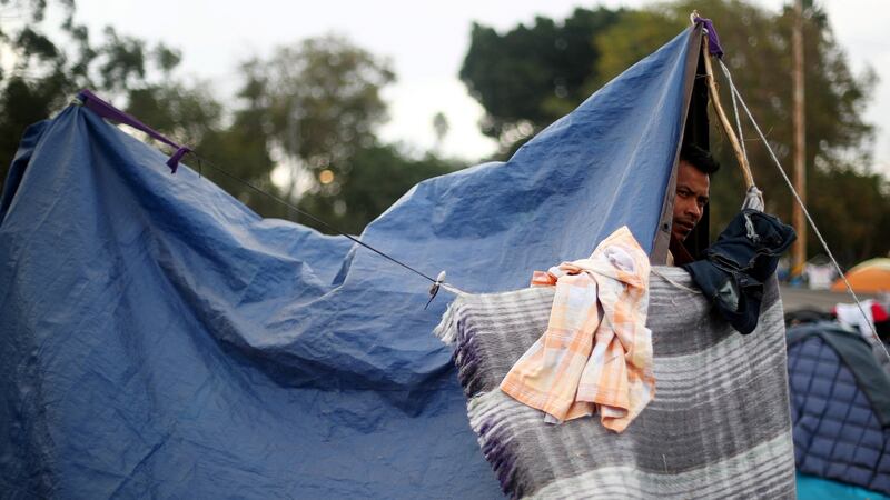 Hoping for refuge in the US while waiting in the migrant shelter in Tijuana, Mexico. Photograph: Hannah McKay/Reuters