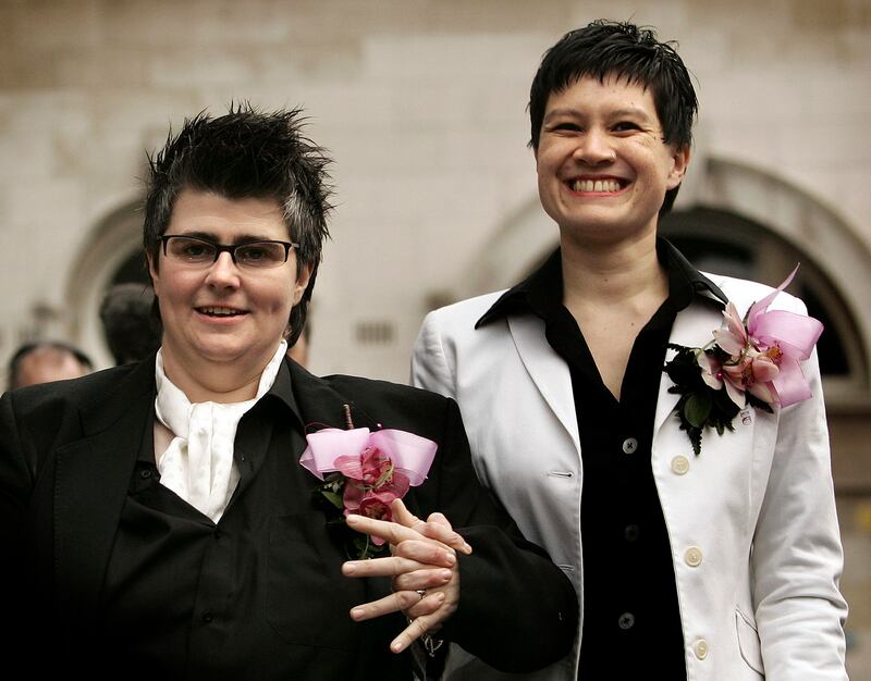 Gráinne Close and Shannon Sickels pictured in Belfast in December 2005 (right) after becoming the UK’s first couple to enter  into a civil partnership. Photograph: Peter Macdiarmid/Getty