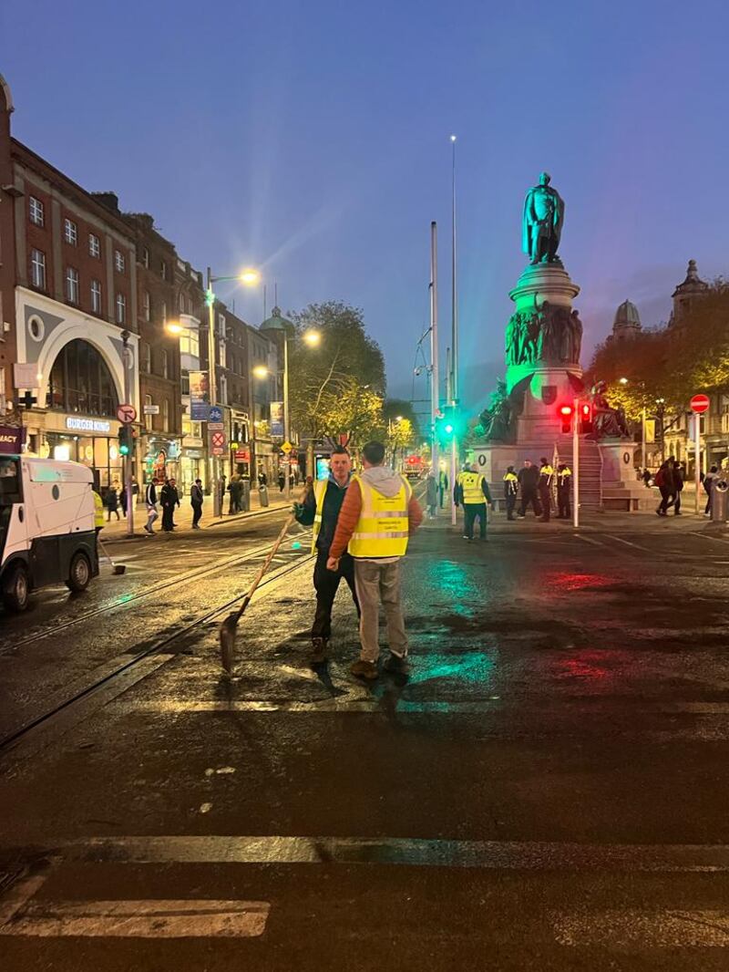 Burned out vehicles and a Luas in Dublin city centre on Friday morning after rioting in the capital on Thursday night. Photograph: Conor Pope