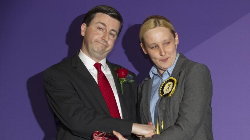 Newly elected Scottish National Party (SNP) member of parliament, Mhairi Black (right), Britain’s youngest member of parliament since 1667, greets Labour candidate Douglas Alexander (left) during the declaration of the general election results for the constituency of Paisley and Renfrewshire South at the Lagoon Leisure Centre,  west  Glasgow in Scotland. Photograph: Getty