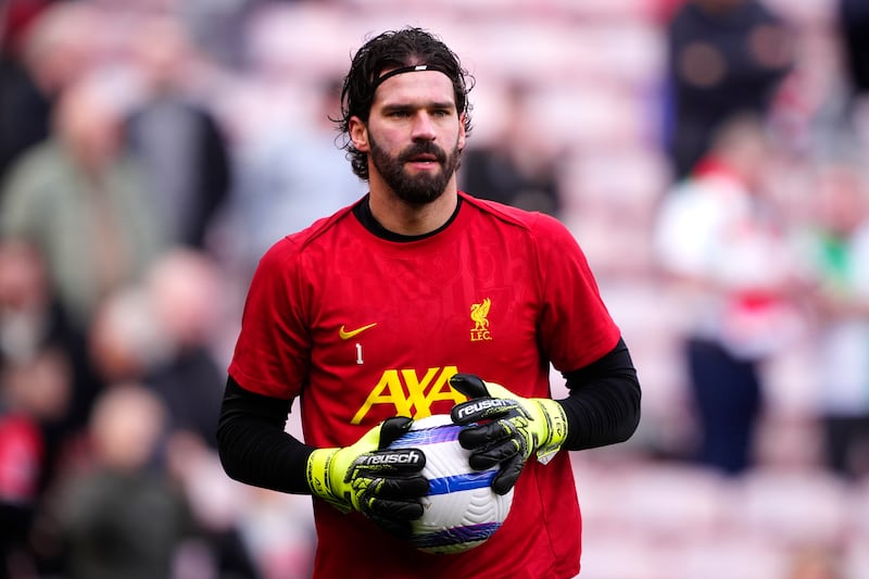 Liverpool goalkeeper Alisson Becker holds on to a ball with those rock-hard hands of his. Photograph: Peter Byrne/PA Wire