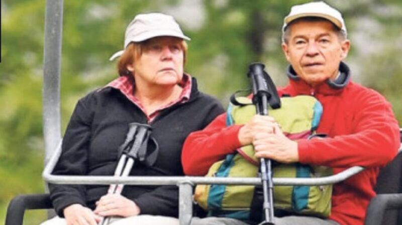 German chancellor Angela Merkel on holiday in northern Italy on Monday with her husband, Joachim Sauer