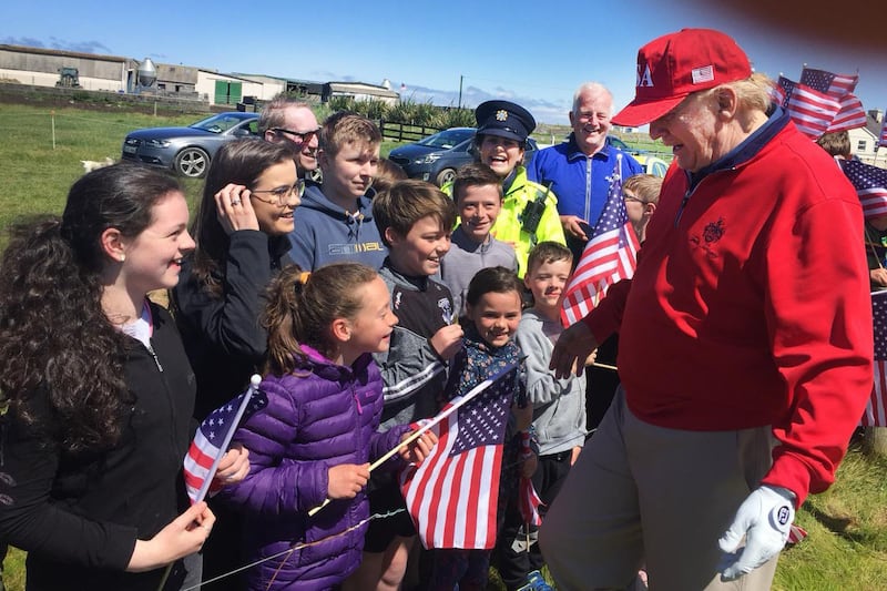 Donald Trump, then US president, greeting schoolchildren and teachers from Clohanes National School at his golf resort in Doonbeg, Co Clare during his 2019 visit to Ireland. Photograph: PA Wire