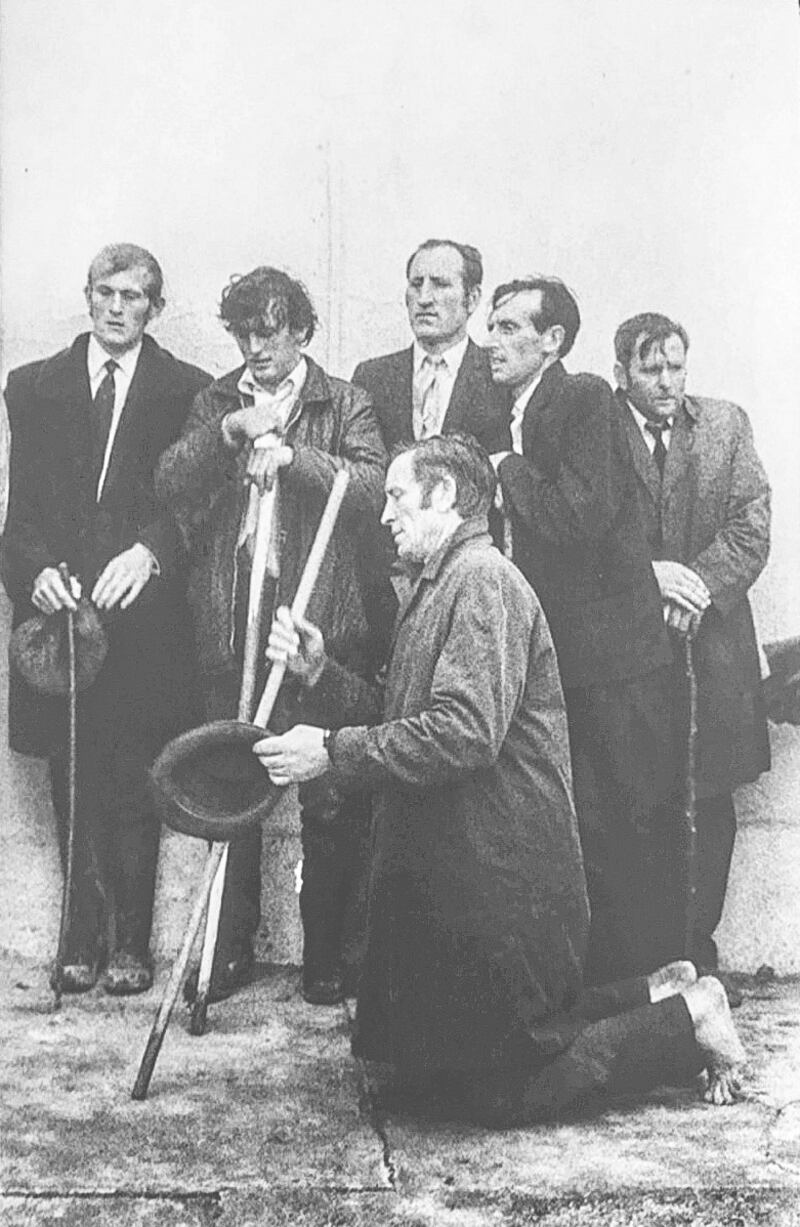 Men praying at the pilgrimage to Croagh Patrick, 1972. Photograph: Markéta Luskačová