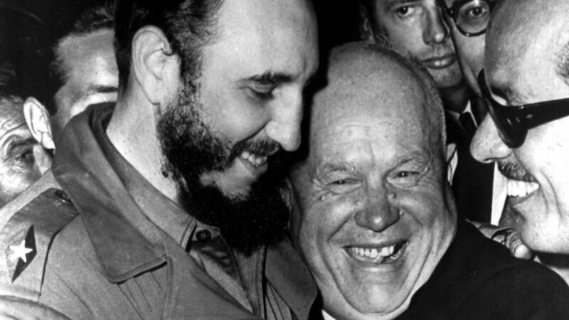 Cuban president Fidel Castro and Soviet leader Nikita Khrushchev hug at the United Nations in this late 1960’s file photo. Photograph: Marty Lederhandler/AP