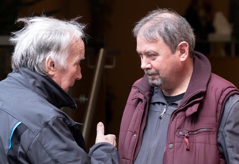 Seán Bissett, president of Motorcycling Ireland, left and photographer John Burke at Dublin District Coroner's Court after giving evidence at the inquest into the death of William Dunlop. Photograph: Colin Keegan/Collins Dublin