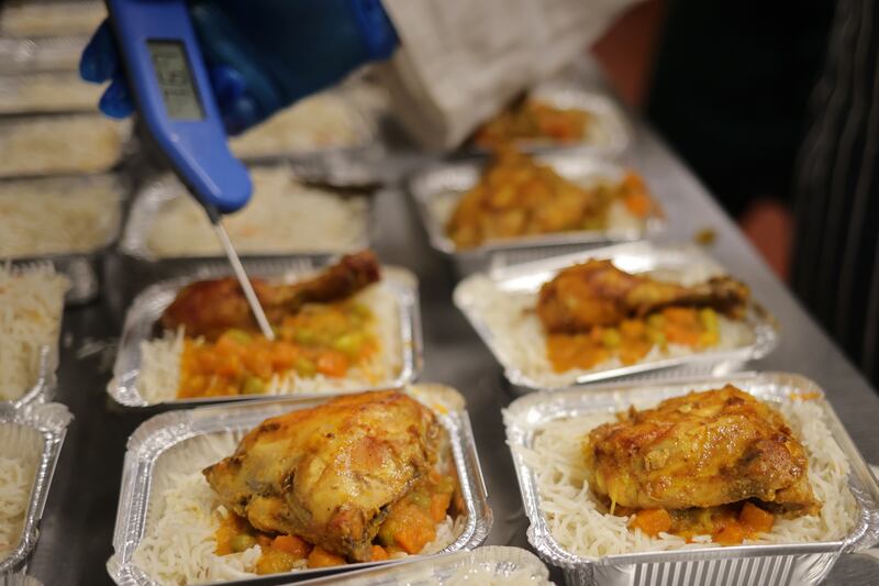 Ismail Benarab, owner of The Golden Olive restaurant in Clonskeagh, prepares 60 chicken dinners at a steep discount for the Muslim Sisters of Éire. Photograph: Chris Maddaloni/The Irish Times