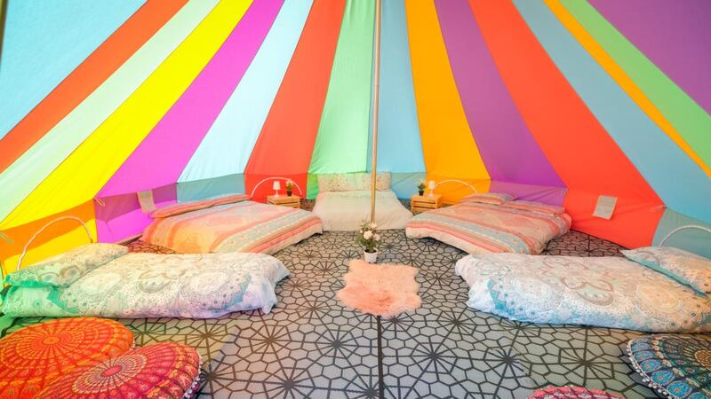 Air beds and duvets make the large tent cosy