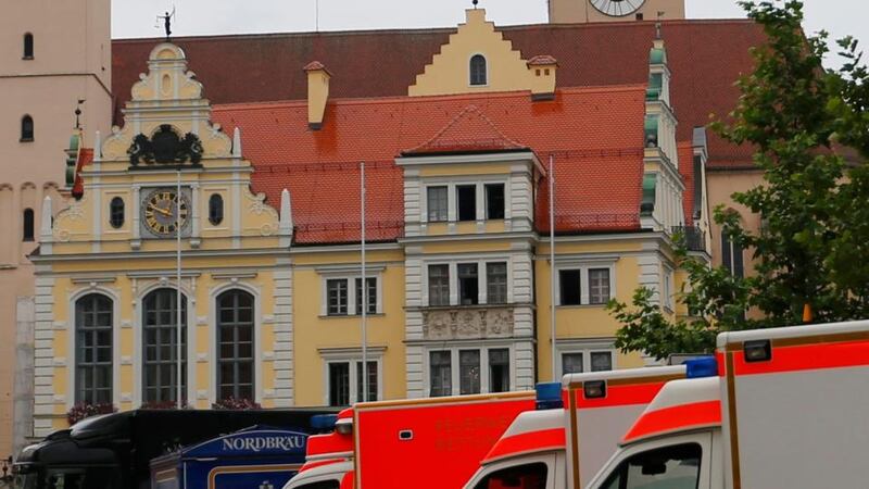 Emergency vehicles stand in a cordoned off street in front of the town hall during the hostage situation. Photograph: Michael Dalder/Reuters