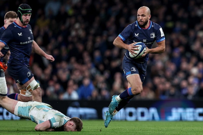 Bath's Finn Russell goes down as Jamison Gibson-Park makes a break to score Leinster's sixth try. Photograph: Ben Brady/Inpho