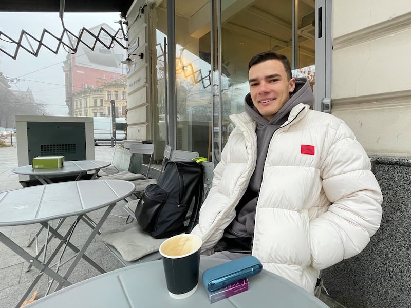 Maks Leonov, a Kyiv law student who also works with cryptocurrency, in a Lviv cafe