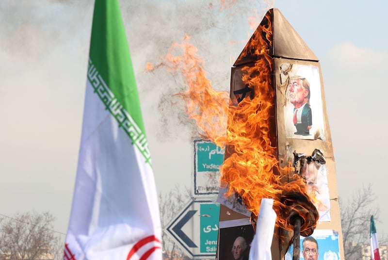 Iranians burn a cardboard structure with a poster of US president Donald Trump during a rally marking the 46th anniversary of the Islamic Revolution in Tehran on February 10th. Photograph: Abedin Taherkenareh/EPA