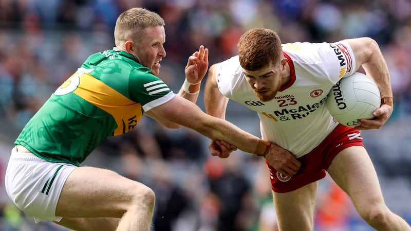 Kerry's Jason Foley with Cathal McShane of Tyrone. Photograph: Ben Brady/Inpho