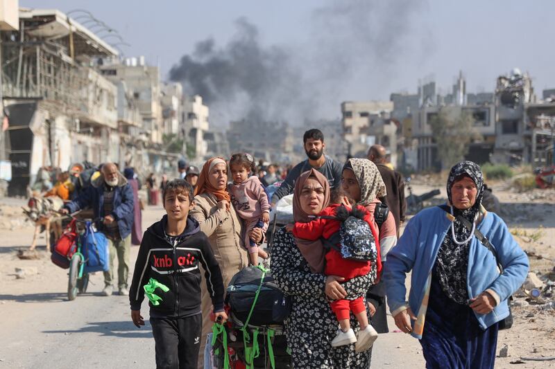 Palestinians displaced from shelters in Beit Hanoun crossing the main Salaheddine road into Jabalia in northern Gaza following Israeli army evacuation orders on November 12th, 2024. Photograph:y Omar Al-Qattaa/AFP