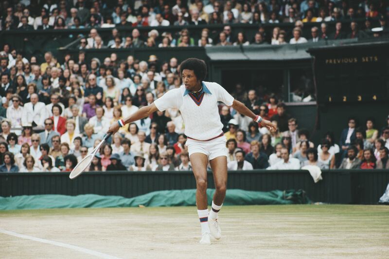 Arthur Ashe makes a backhand return to Jimmy Connors on his way to winning the men's singles final at Wimbledon in 1975. Photograph: by Tony Duffy/Allsport/Getty Images