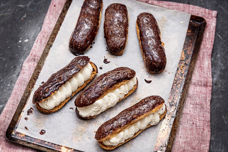 Chocolate éclairs. Photograph: Harry Weir
