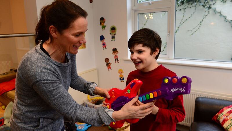 Roz O’Connor and her son Bradley at home in Dublin. Photograph: Dara Mac Donaill