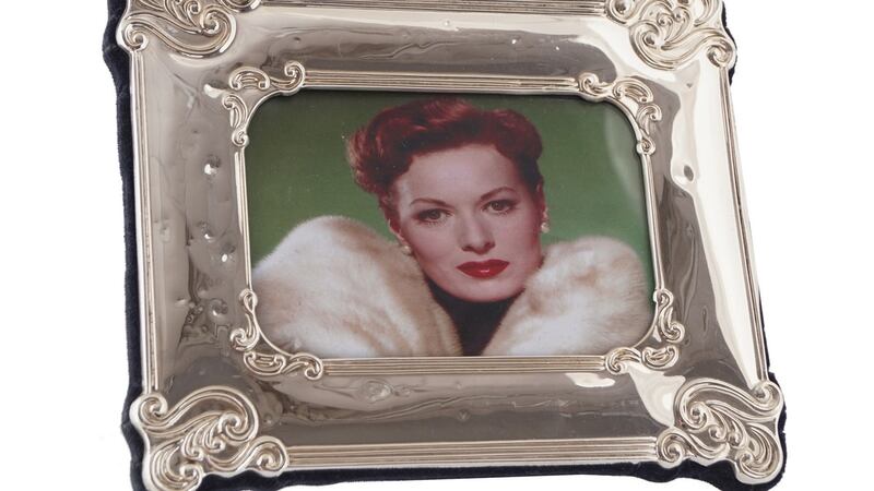 Framed photograph of Maureen O’Hara  wearing her Dior white mink made €380