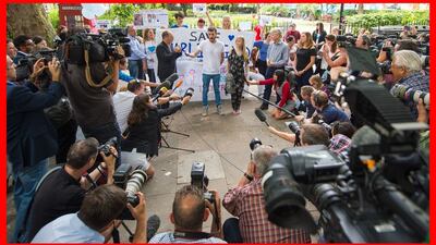 Connie Yates and Chris Gard speak to the media in Queen Square, London.