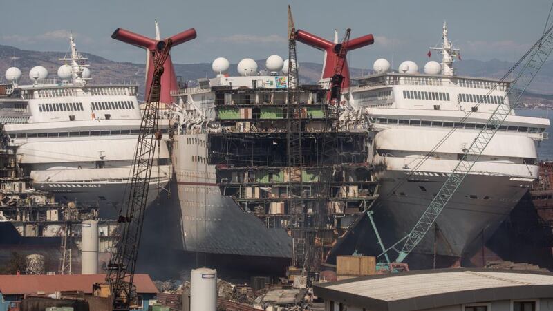 Luxury cruise ships are seen being broken down for scrap metal. Photograph: Chris McGrath/Getty