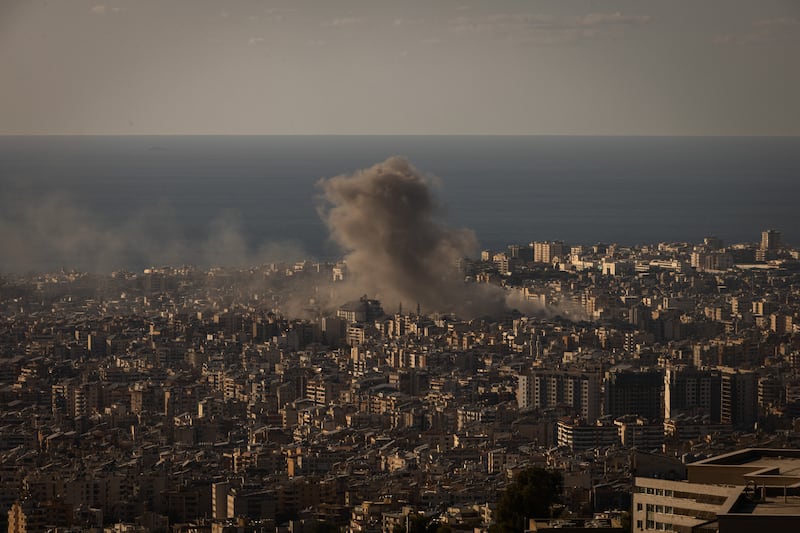 Smoke billows from multiple Israeli airstrikes targeting the Hara Hreik neighborhood of Beirut, Lebanon on Sunday. Photograph: Diego Ibarra Sánchez/The New York Times
                      